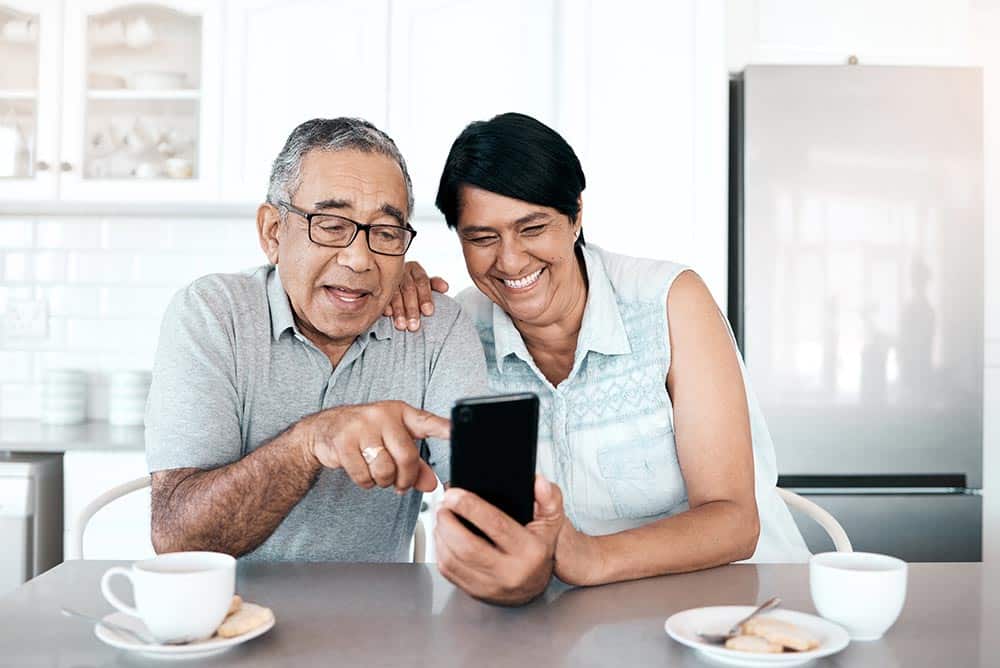 Couple Looking at a Mobile Device